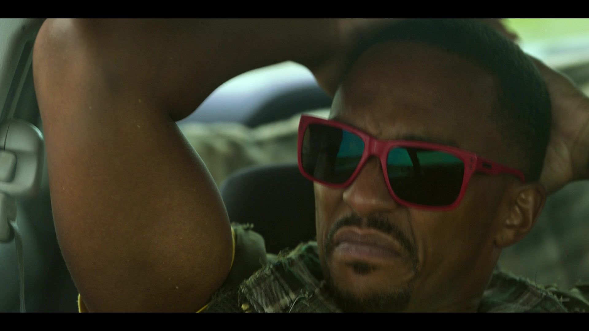 Worn on Twisted Metal TV Show - Red Frame Sunglasses Worn by Anthony Mackie as John Doe
