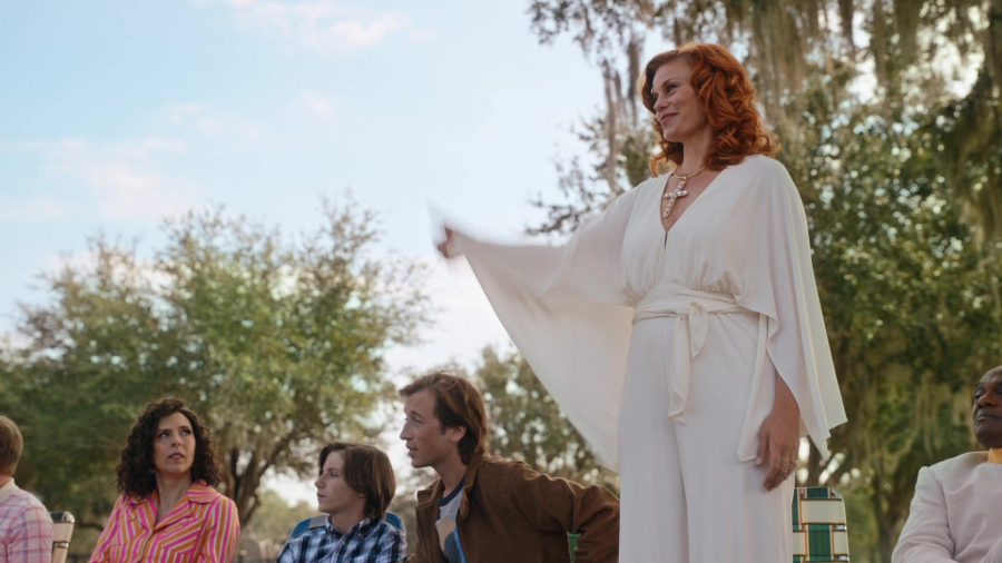 white v-neck jumpsuit with wide sleeves and tie belt - Cassidy Freeman (Amber Gemstone) - The Righteous Gemstones TV Show