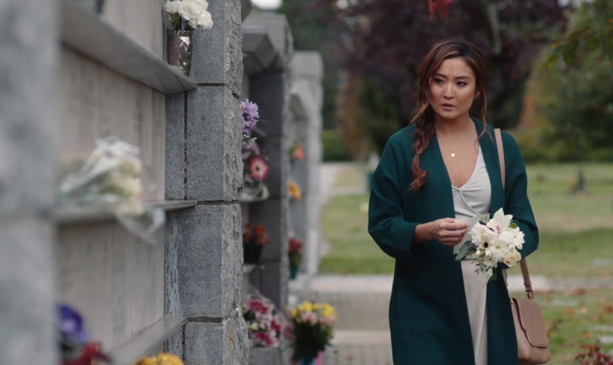 Green Coat of Ashley Park as Audrey Sullivan