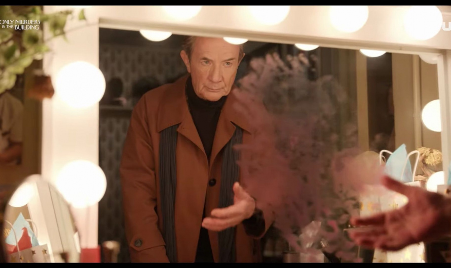 Brown Coat of Martin Short as Oliver Putnam