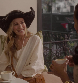 White Dress, Wide Brim Hat and Pearl Necklace of Sarah Jessica Parker as Carrie Bradshaw Outfit And Just Like That... TV Show
