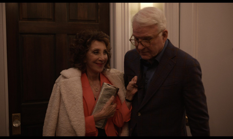 Crocodile Pattern Clutch of Andrea Martin as Joy Payne