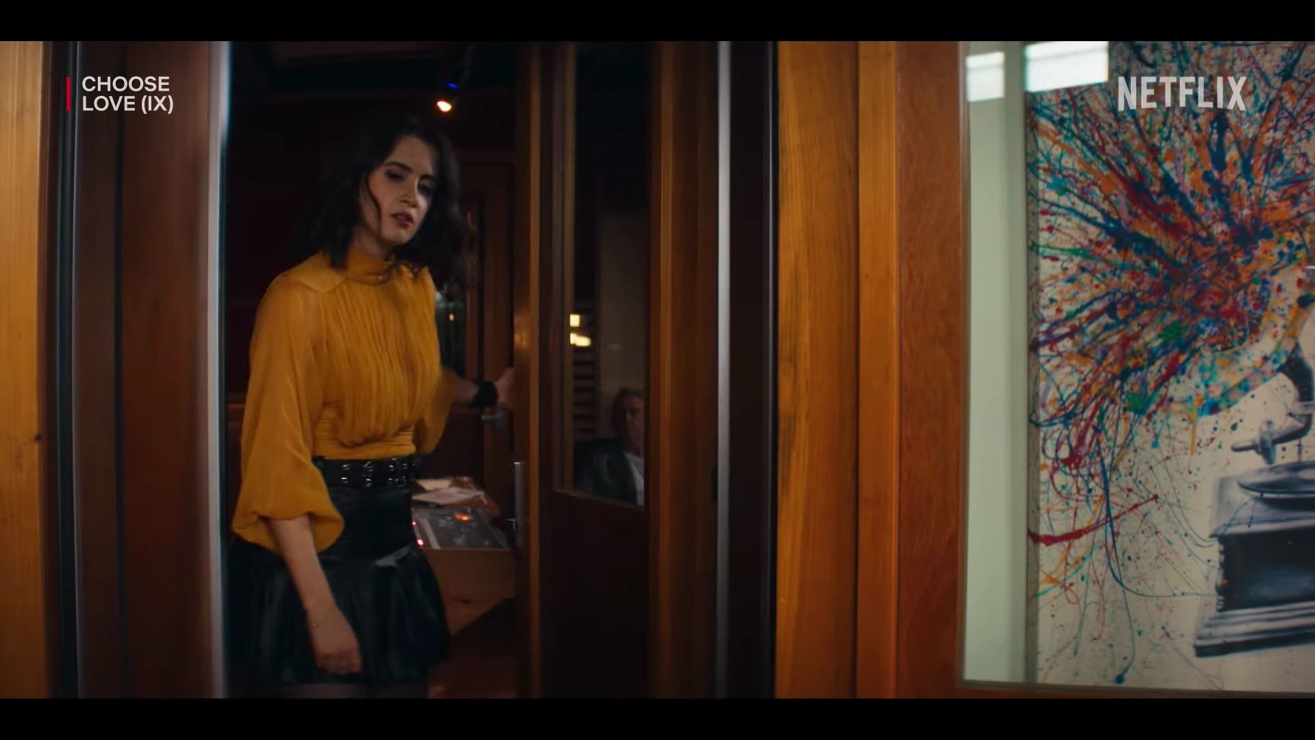 Worn on Choose Love (2023) Movie - Black Leather Pleated Mini Skirt Worn by Laura Marano as Cami