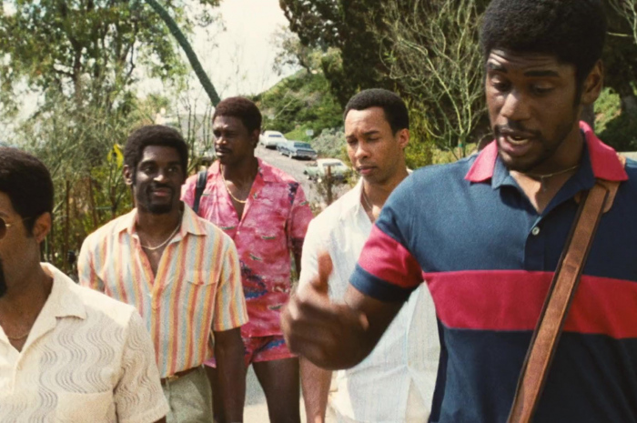 Blue and Red Polo Shirt Worn by Quincy Isaiah as Magic Johnson Outfit Winning Time: The Rise of the Lakers Dynasty TV Show