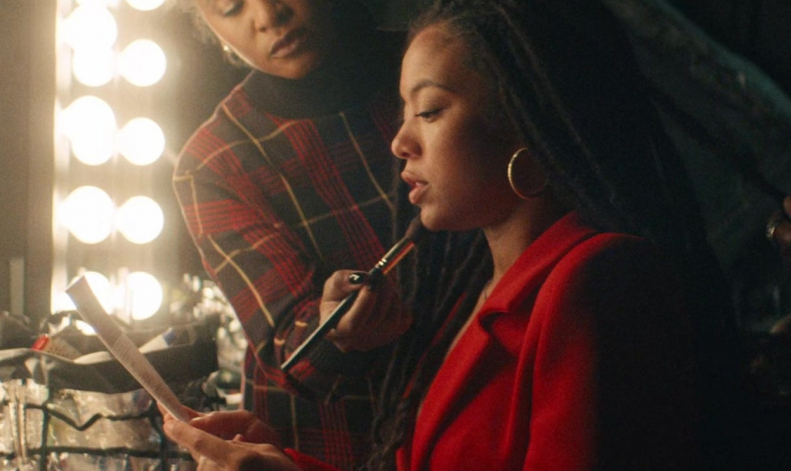 Red Pantsuit of Jaz Sinclair as Marie Moreau