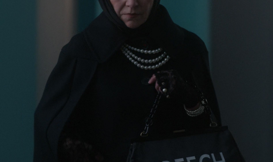 Preech Bag of Julie White as Io Preecher