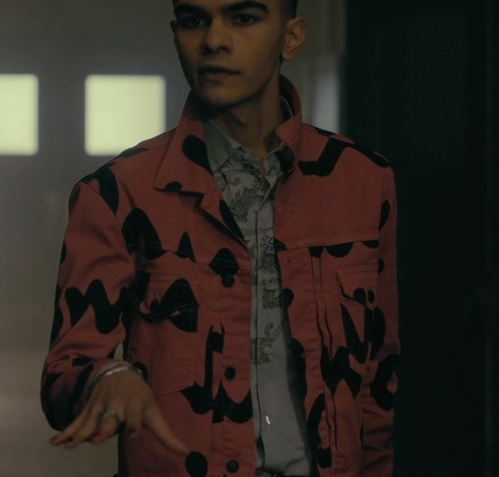 Coral Jacket with Bold Black Abstract Patterns Worn by Sauriyan Sapkota as Prospero “Perry” Usher