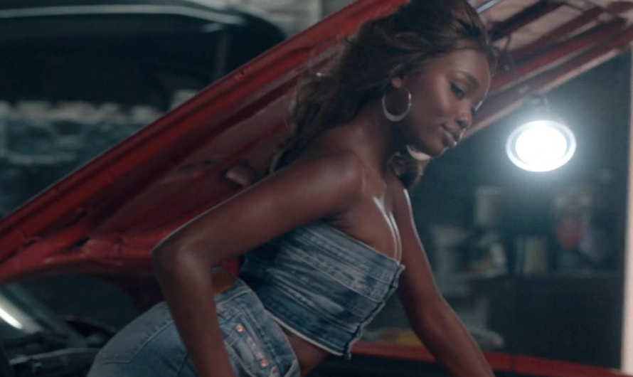 Distressed Denim Tube Top of Laura Kariuki as Vivian Lee Finch