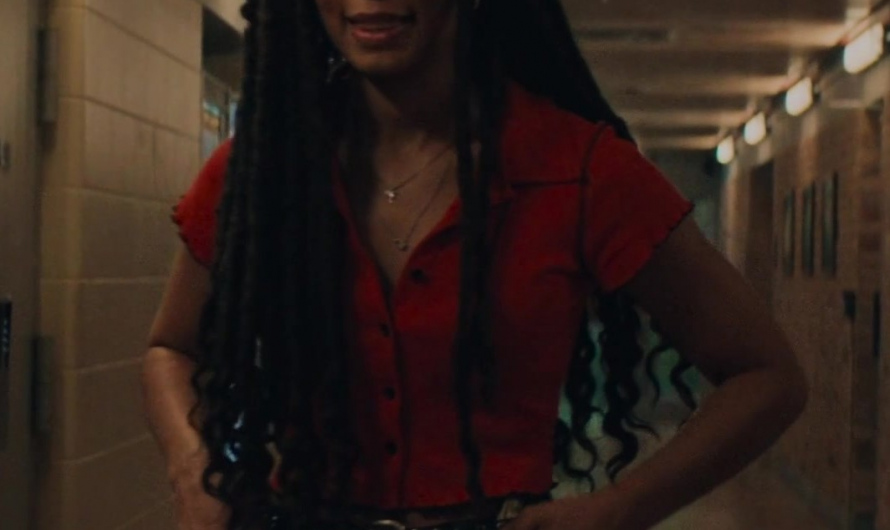 Red Short-Sleeved Shirt Worn by Jaz Sinclair as Marie Moreau
