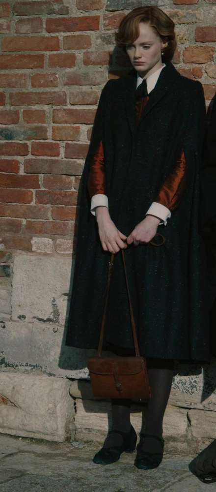 elegant black cape coat - Emma Laird (Desdemona Holland) - A Haunting in Venice (2023) Movie