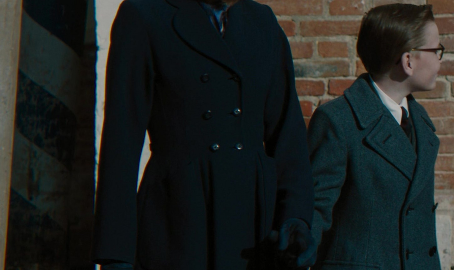 Navy Double-Breasted Coat with Peak Lapels Worn by Camille Cottin as Olga Seminoff