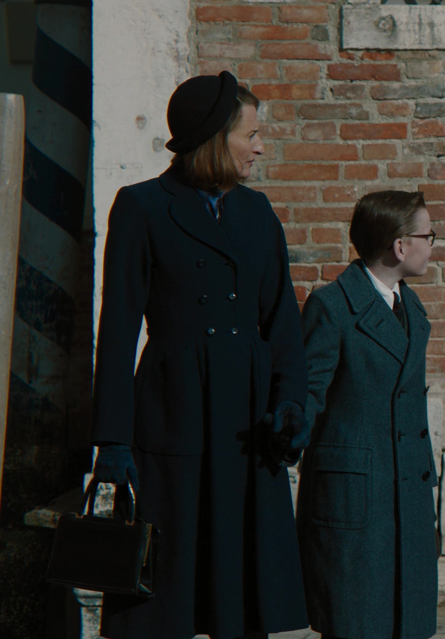 Worn on A Haunting in Venice (2023) Movie - Navy Double-Breasted Coat with Peak Lapels Worn by Camille Cottin as Olga Seminoff