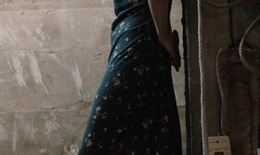Black Floral Dress of Kelly Reilly as Bethany “Beth” Dutton