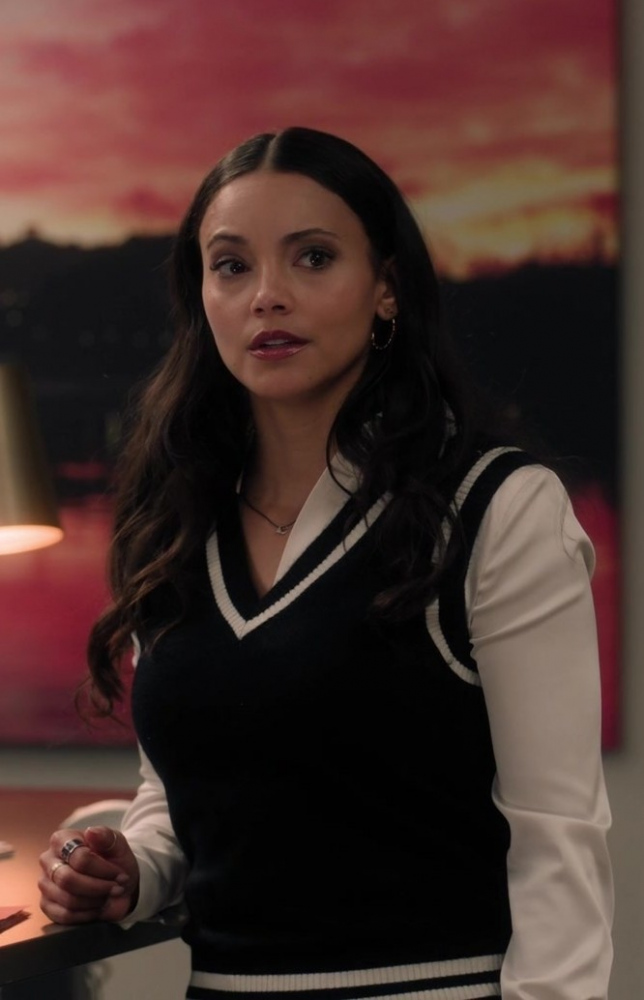 black v-neck sweater vest with white striped trim - Gabrielle Walsh (Lacey Quinn) - Found TV Show