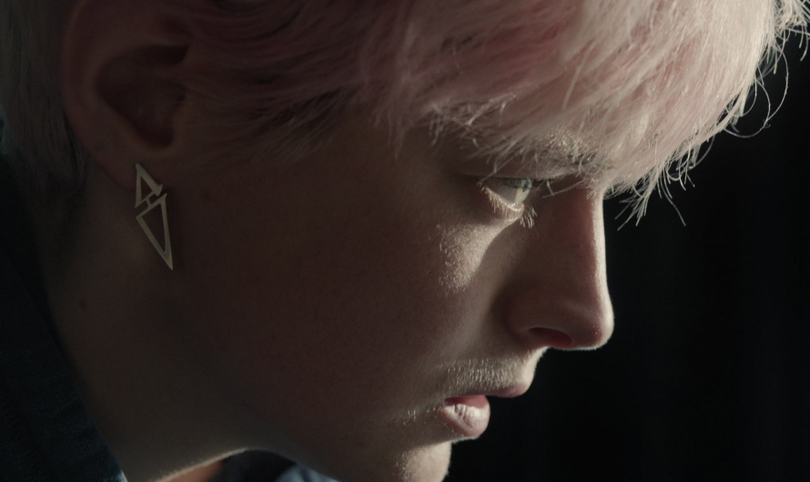 Geometric Triangle-Shaped Stud Earrings of Emma Corrin as Darby Hart