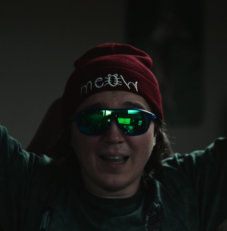 Meow Logo Beanie of Paul Dano as Keith Gill from Dumb Money (2023) Movie