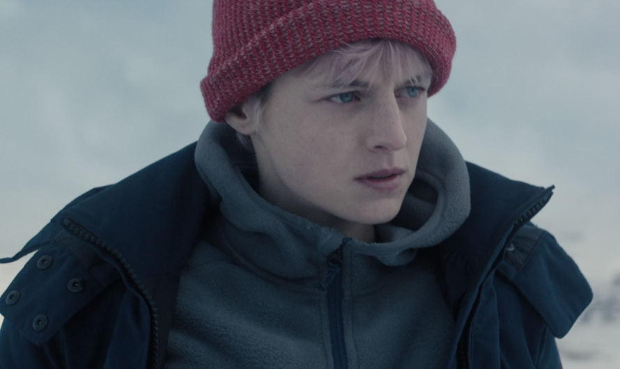 Red Beanie of Emma Corrin as Darby Hart