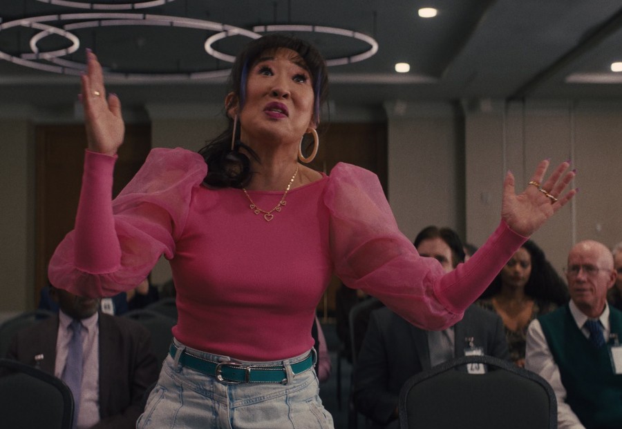 pink puff sleeve sheer organza blouse - Sandra Oh (Jenny Yum) - Quiz Lady (2023) Movie