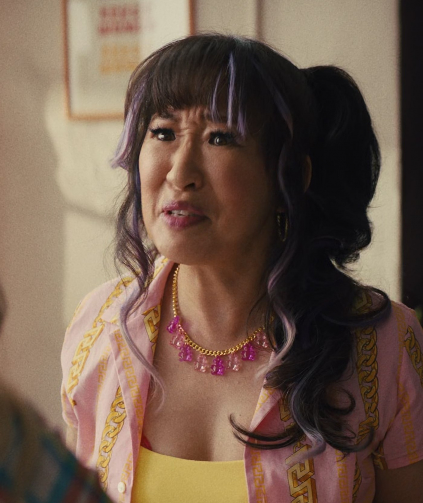pink gummy bear necklace - Sandra Oh (Jenny Yum) - Quiz Lady (2023) Movie