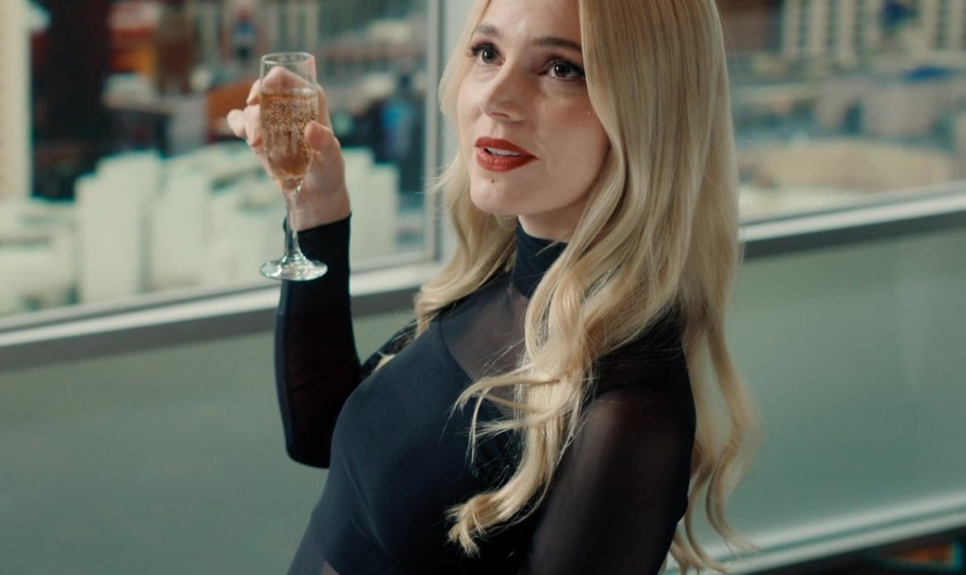 Chic Black Mesh Panel Top with High Neck Worn by Alyson Gorske as Lana