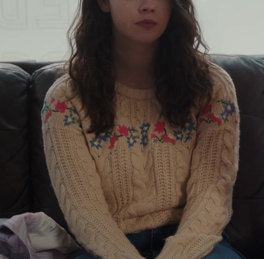 Beige Sweater with Colorful Embroidered Flowers Worn by Ellie O’Brien as Grace