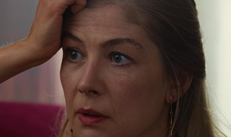 Elegant Gold Chain Dangle Earrings with Ruby Accents of Rosamund Pike as Lady Elspeth Catton
