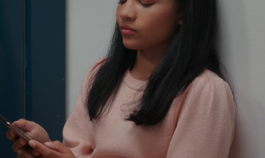 Pastel Pink Crew Neck Sweater of Nikki Rodriguez as Jackie Howard