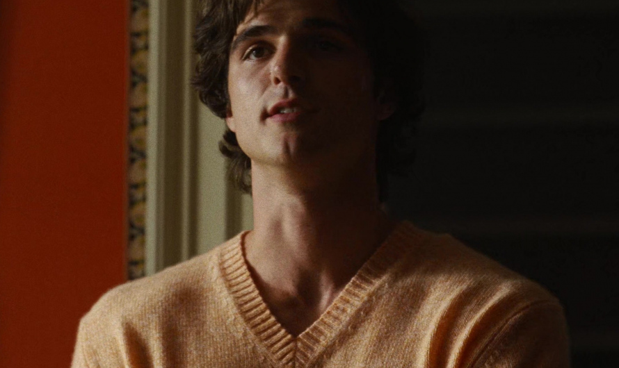 Orange V-Neck Knit Sweater Worn by Jacob Elordi as Felix Catton