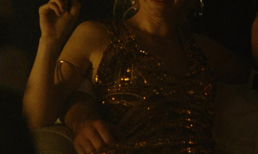 Gold Sequin Evening Gown of Alison Oliver as Venetia Catton