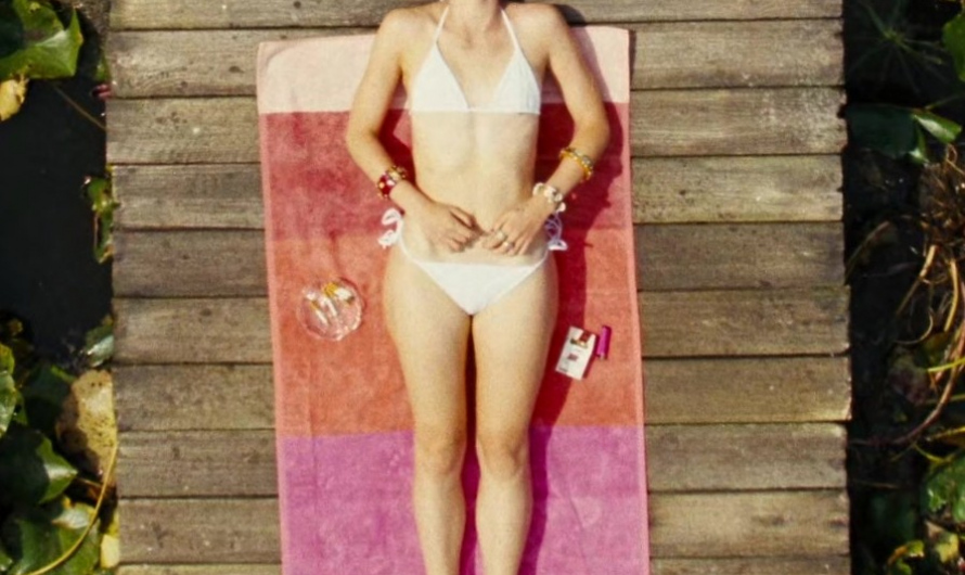 White Two-Piece Bikini Set of Alison Oliver as Venetia Catton