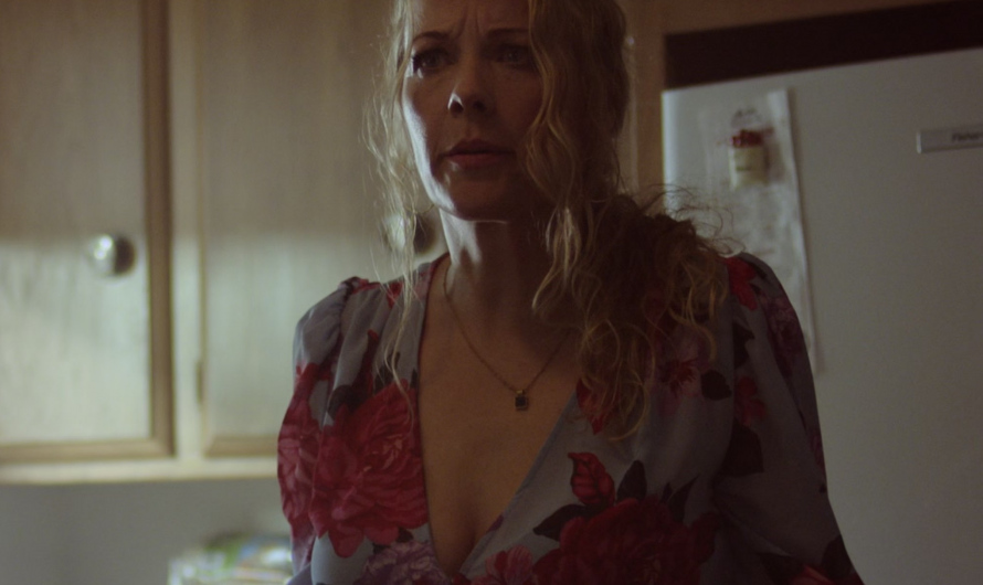 Floral Long Sleeve V-Neck Blouse Worn by Andrea Anders as Sandra