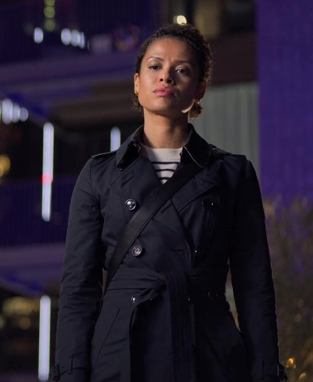 black belted trench coat - Gugu Mbatha-Raw (Abby) - Lift (2024) Movie