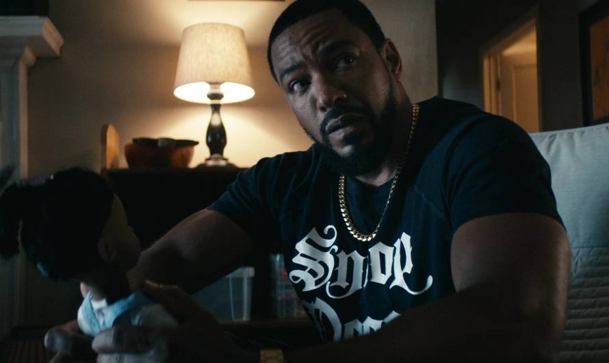 Snoop Dog Logo Black T-Shirt of Laz Alonso as Marvin T. “Mother’s” Milk / M.M.