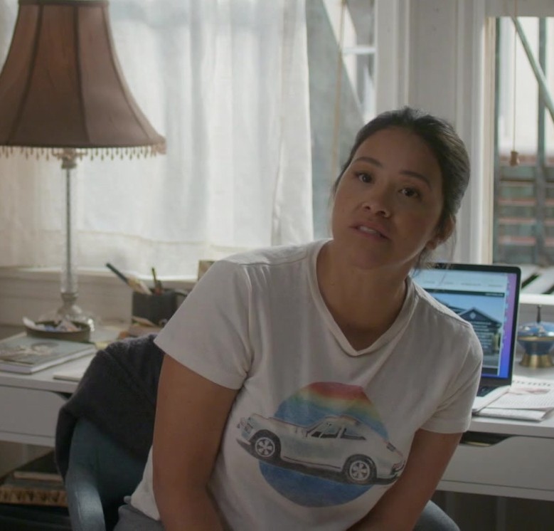 White T-Shirt Featuring Nostalgic Car Illustration Worn by Gina Rodriguez as Nell Serrano from Not Dead Yet TV Show