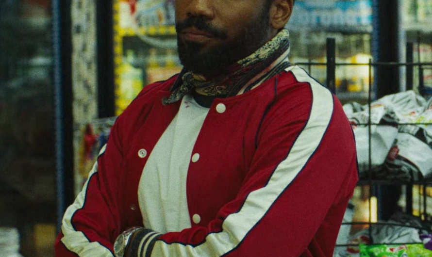 Red and White Varsity Jacket Worn by Donald Glover as John Smith