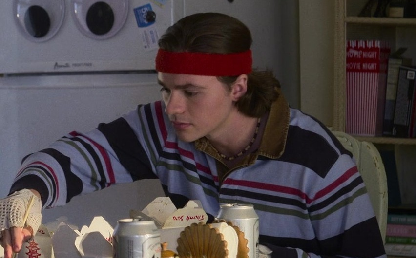 Striped Rugby Shirt Worn by Joel Courtney as Little