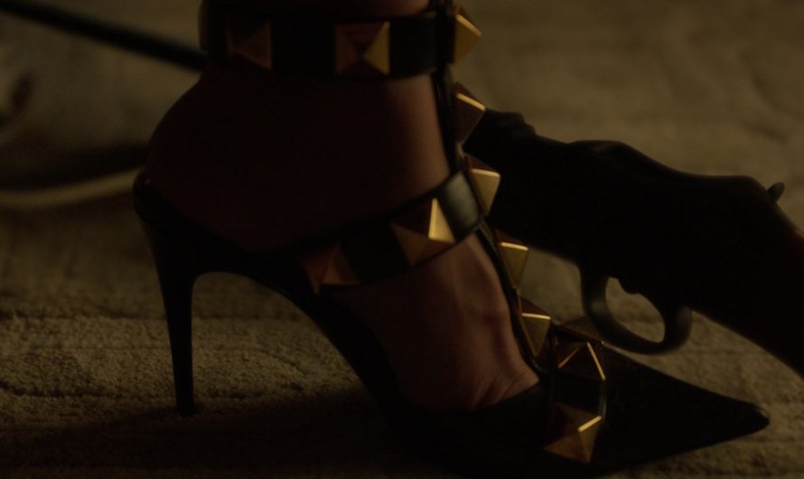 Edgy Black Stiletto Heels with Bold Golden Studs Worn by Angela Zhou as Teddy Goh