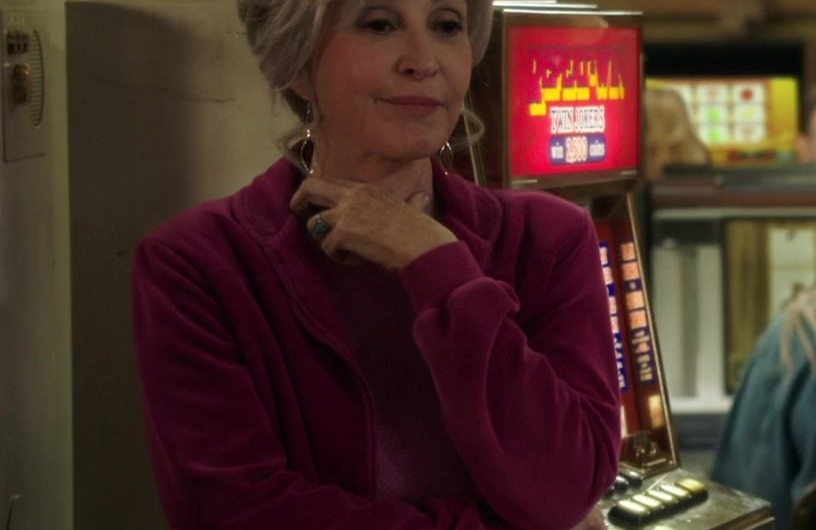 Vibrant Fuchsia Zip-Up Fleece Jacket of Annie Potts as Constance “Connie” Tucker