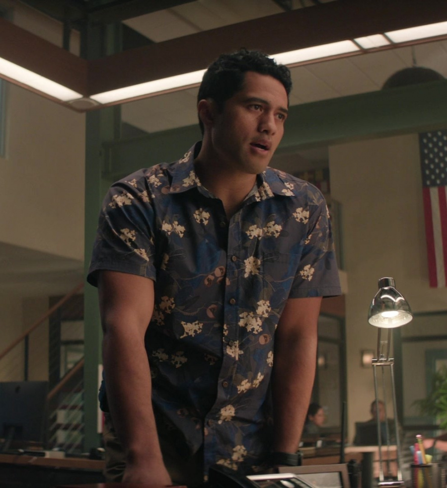 Island-Inspired Blue Button-Up Shirt with Hibiscus Flower Patterns  Worn by Alex Tarrant as Kai Holman from NCIS: Hawai'i TV Show