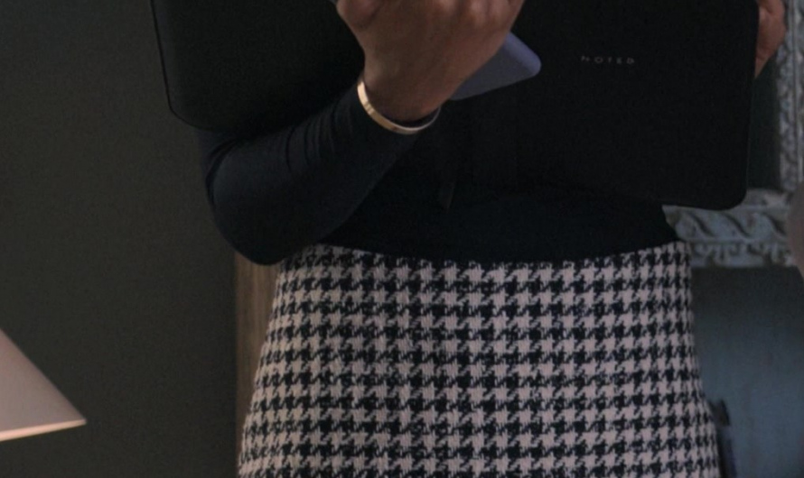 Classic Houndstooth A-Line Mini Skirt with Pleated Hem of Fola Evans-Akingbola as Renee