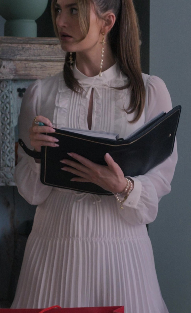 White Pleated Midi Dress with High Neck and Tie Detail Worn by Rachel Matthews as Suzette from Upgraded (2024) Movie