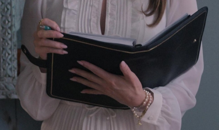 White Pleated Midi Dress with High Neck and Tie Detail Worn by Rachel Matthews as Suzette