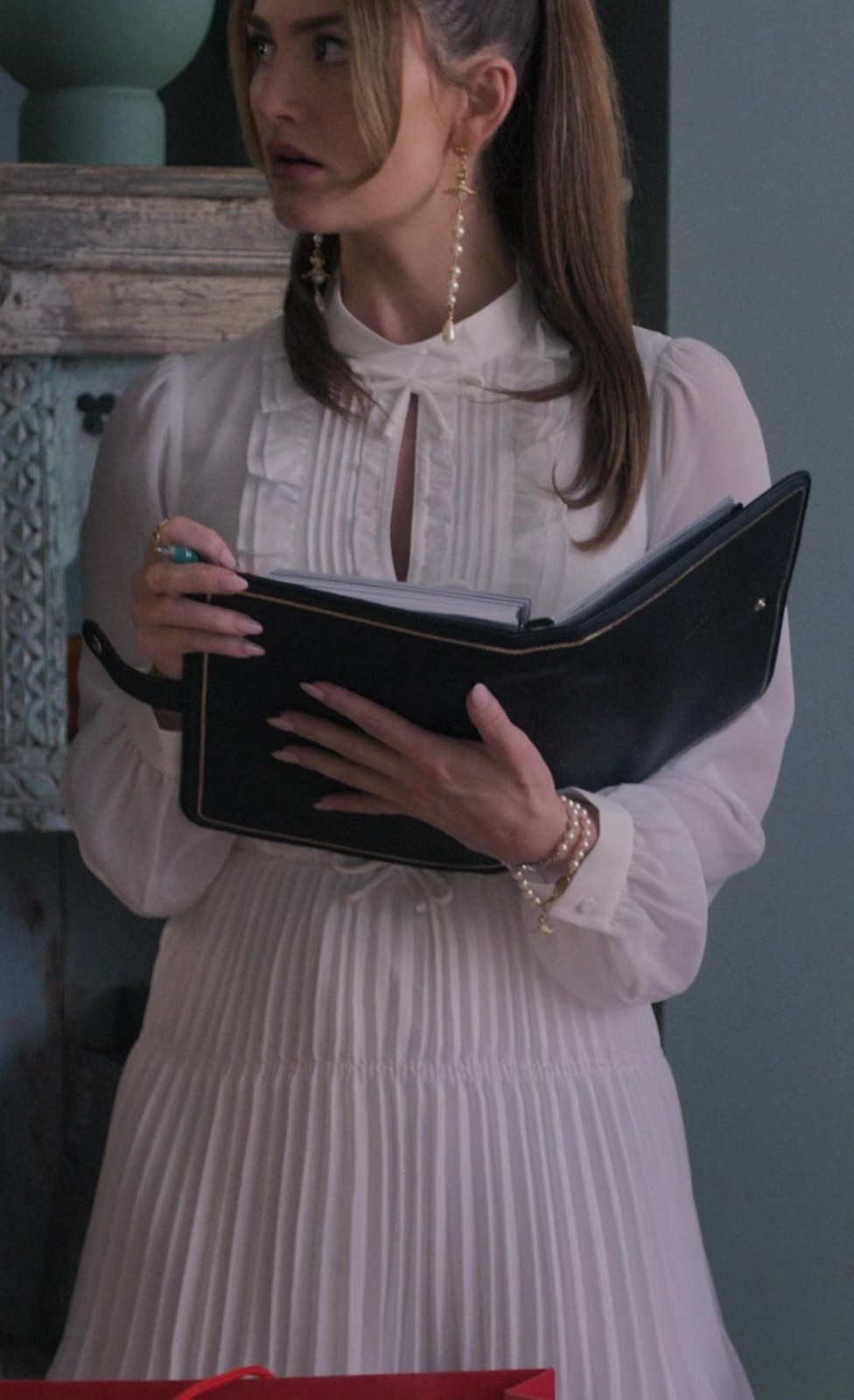 Worn on Upgraded (2024) Movie - White Pleated Midi Dress with High Neck and Tie Detail Worn by Rachel Matthews as Suzette