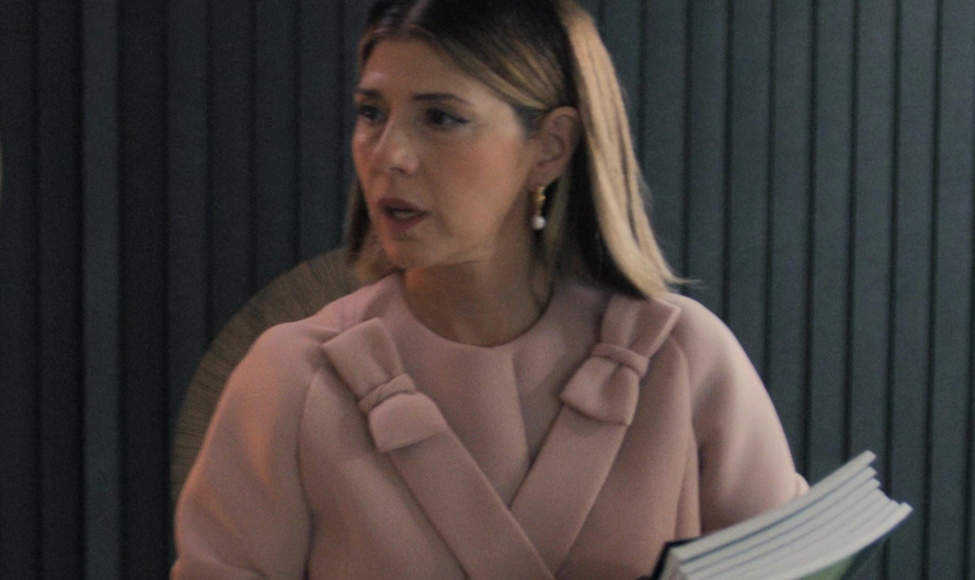 Pink Neoprene Bow Jacket with Straps Worn by Marisa Tomei as Claire Dupont