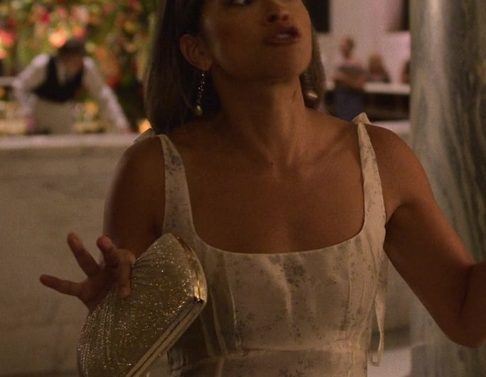 Sparkly Gold Clutch Bag of Gina Rodriguez as Mack