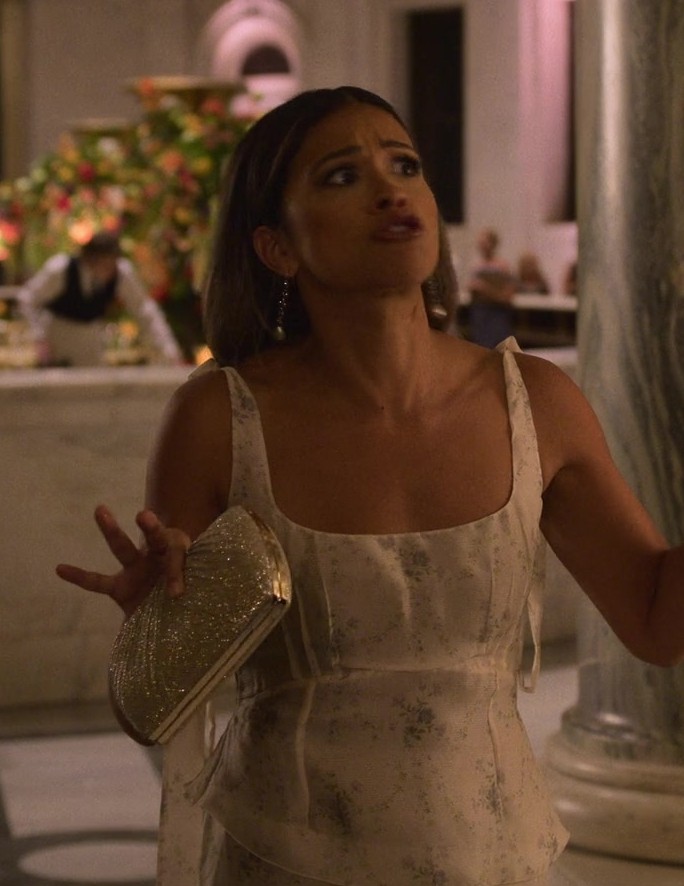 sparkly gold clutch bag - Gina Rodriguez (Mack) - Players (2024) Movie