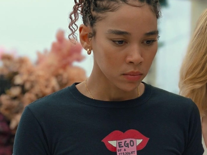 Blue Tee with Provocative Phrase and Lip Icon Worn by Alexandra Shipp as Claudia