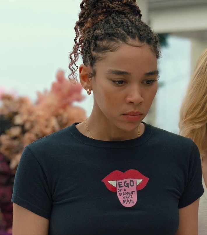 Blue Tee with Provocative Phrase and Lip Icon Worn by Alexandra Shipp as Claudia