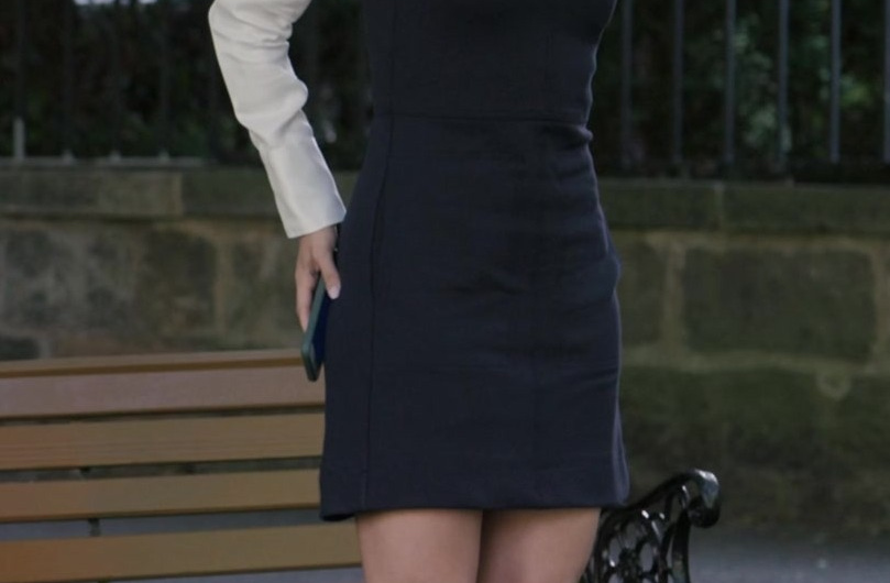 Black Sleeveless Pinafore Mini Dress of Camila Mendes as Ana