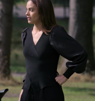 Worn on Upgraded (2024) Movie - Black Peplum Top with Ribbed Texture and Statement Sleeves of Camila Mendes as Ana